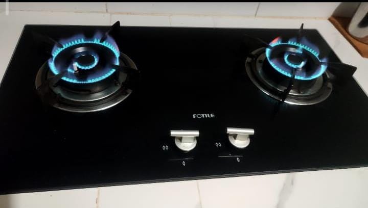 Pembersihan dan servis burner tungku api kompor tanam